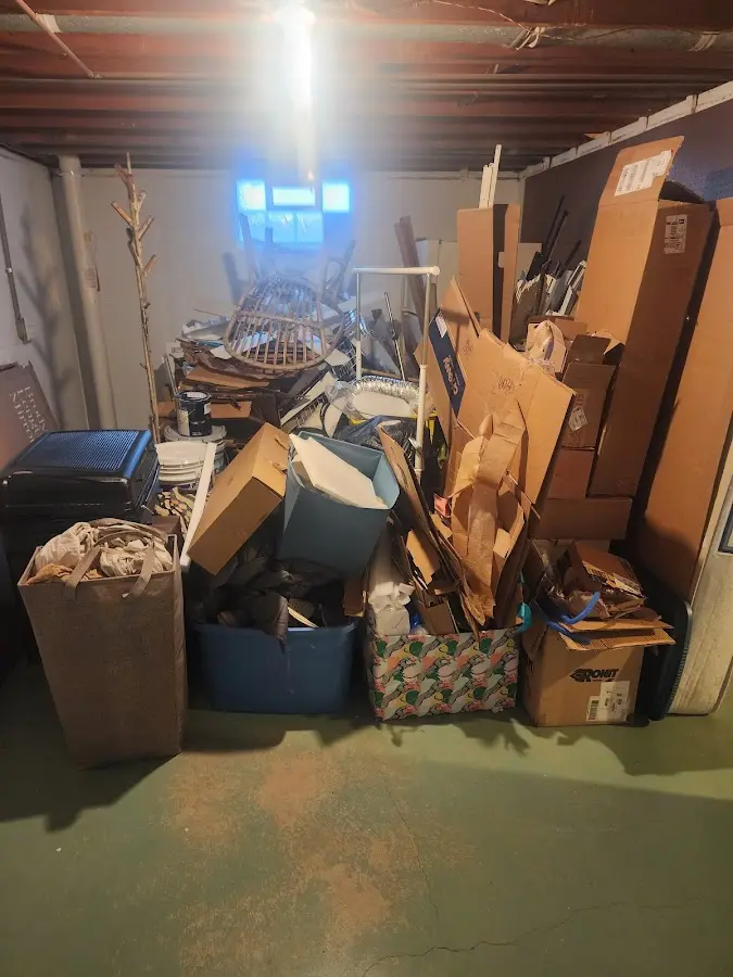 Roll-off dumpster container at job site for Yard Waste Dumpster Rental in Warrensburg